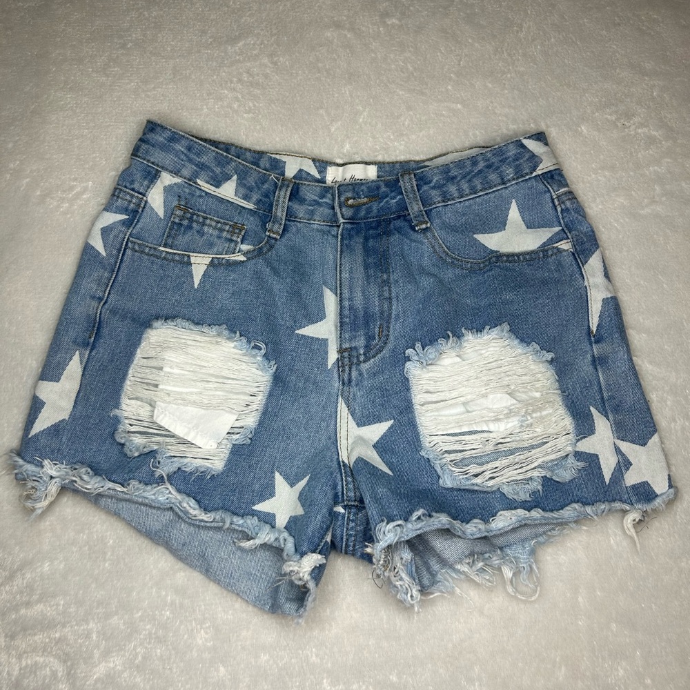 High waisted white star patterned blue jean shorts